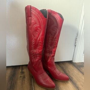 Women’s red knee high cowboy boots